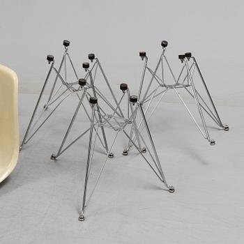 A 'DSR' chair and three loose seat  by Charles & Ray Eames for Vitra, 1960s/70s.