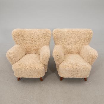 Ilmari Lappalainen, a pair of armchairs, for Asko.