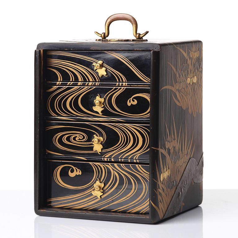 A Japanese lacquered box with four drawers, Meiji period (1868-1912).