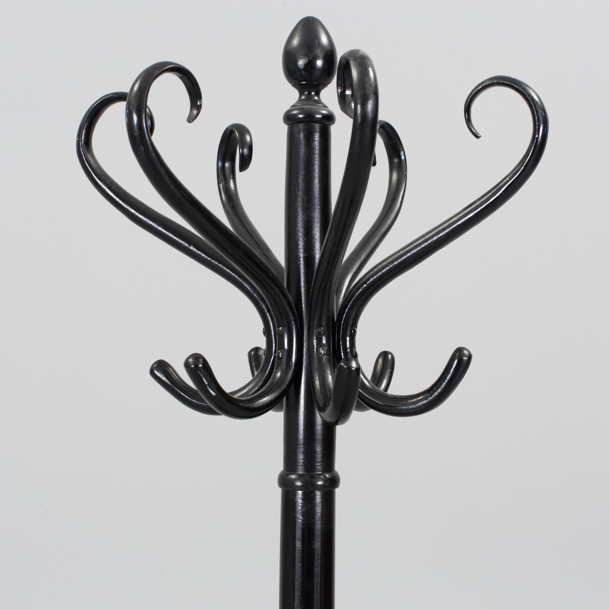 A 20th century wooden hat and coat stand.