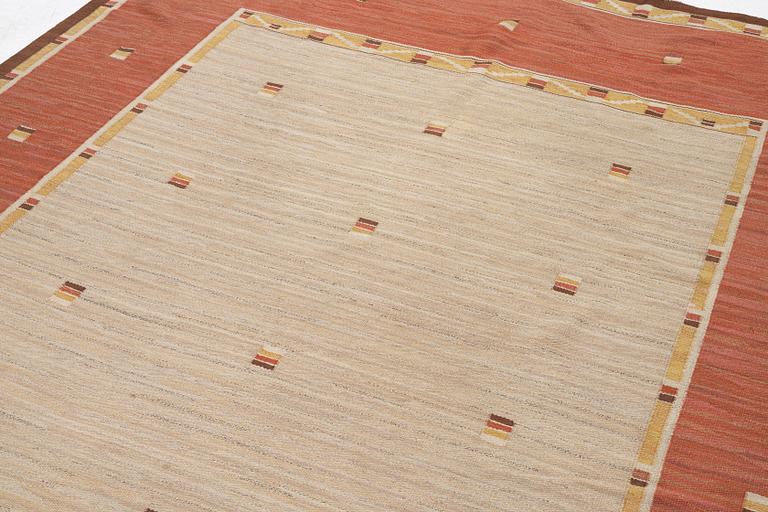 A flat weave carpet, c. 360 x 265 cm.