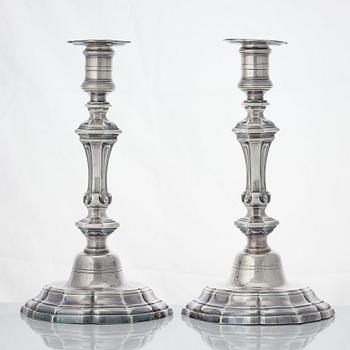 A pair of French Louis XV silver candlesticks, mark of Claude-Antoine Charvet, Paris (1757-1782).