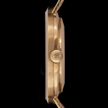 ARMBANDSUR, herr, Patek Philippe, Golden Ellipse, ref 3548/1, 18k guld. 1970-tal. Vikt ca77g.