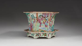 A Canton famille rose flower pot with stand, Qing dynasty, 19th Century.