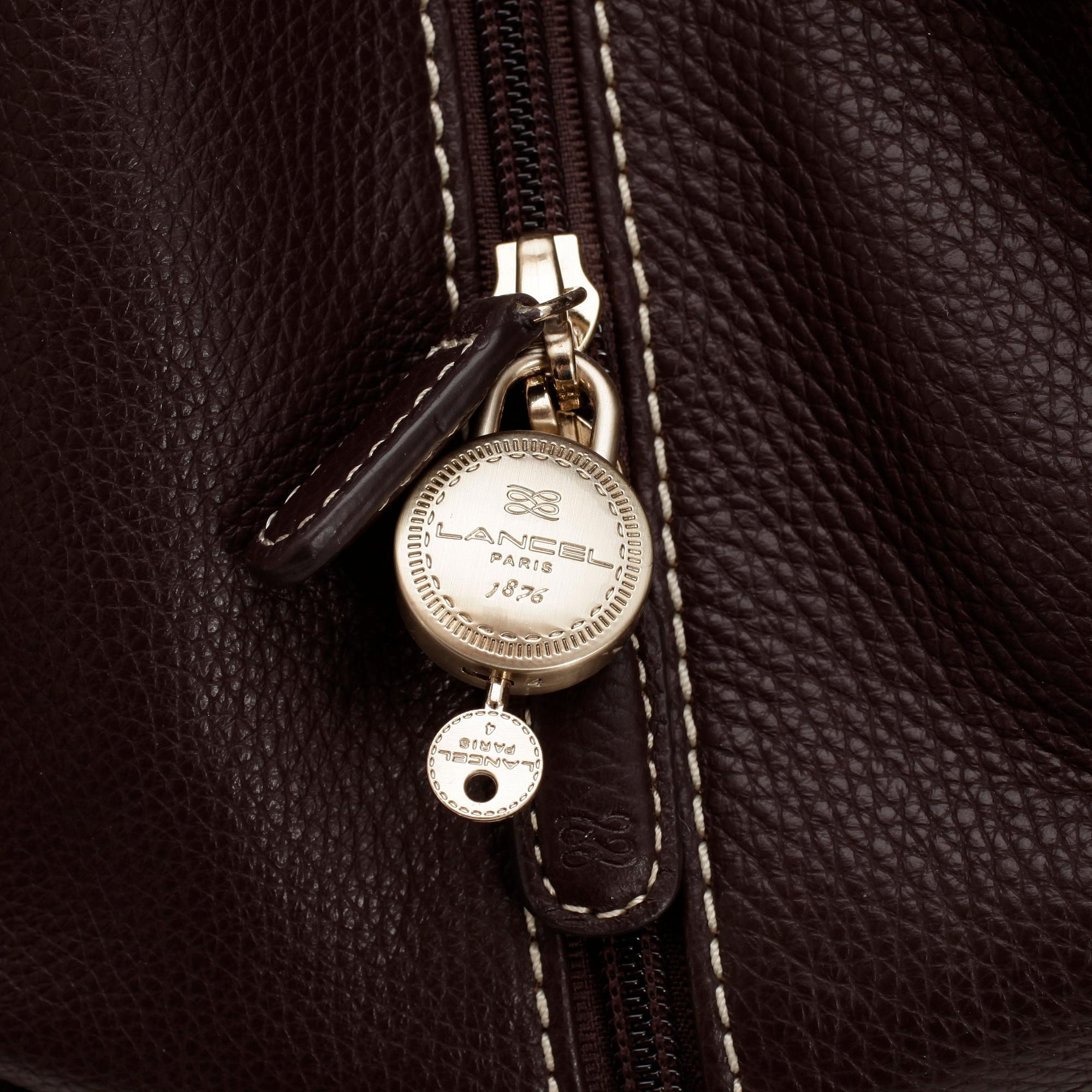 LANCEL, a brown leather bag.