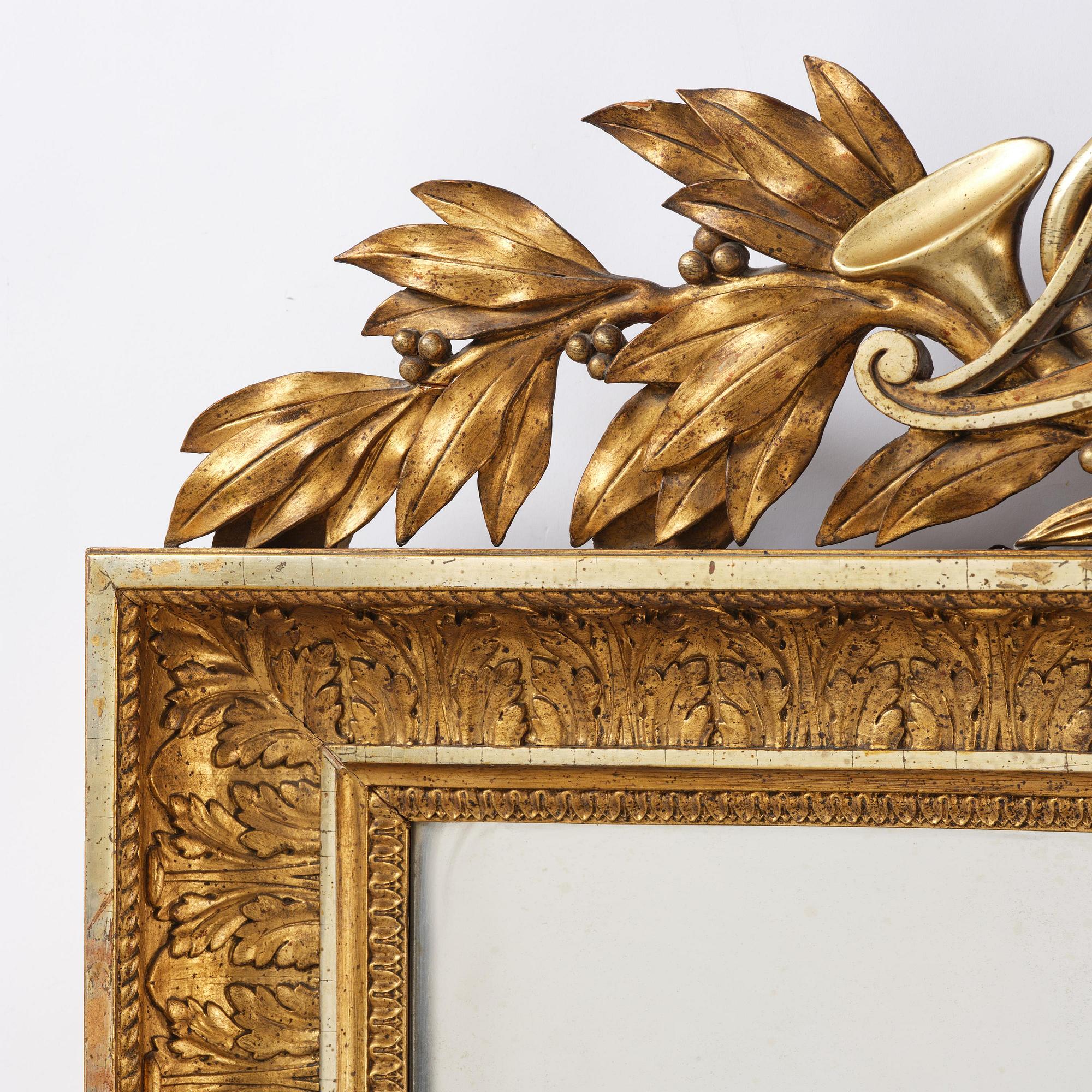 A two-branch Empire giltwood girandole mirror by P. G. Bylander (master in Gothenburg 1811-58).