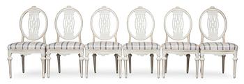 A SET OF 6 CHAIRS.