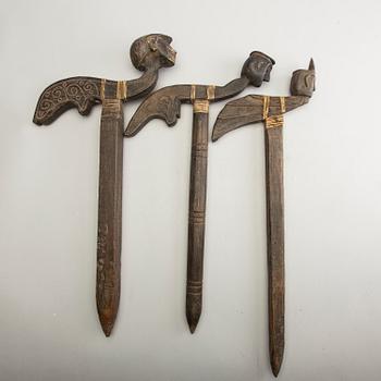 Three Javanese wooden planting sticks, presumably early 20th Century.