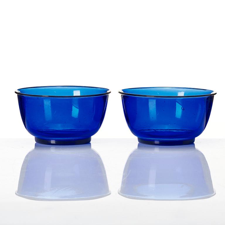 A pair of Chinese blue Beijing glass bowls, 20th century.