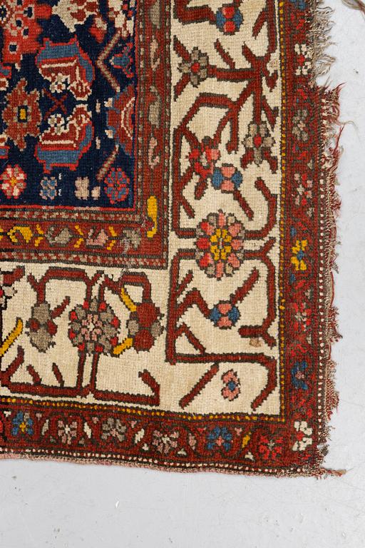 A rug, antique Kurdish, ca 247-253 x 116-125 cm.