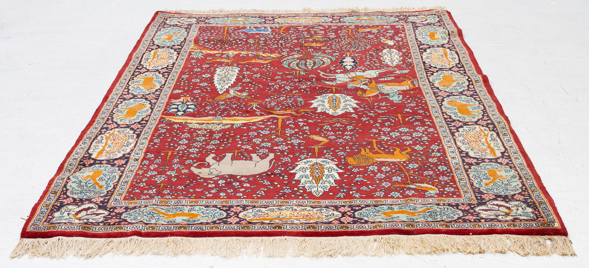 Carpet, Tabriz, with hunting motif. 220 x 140 cm.