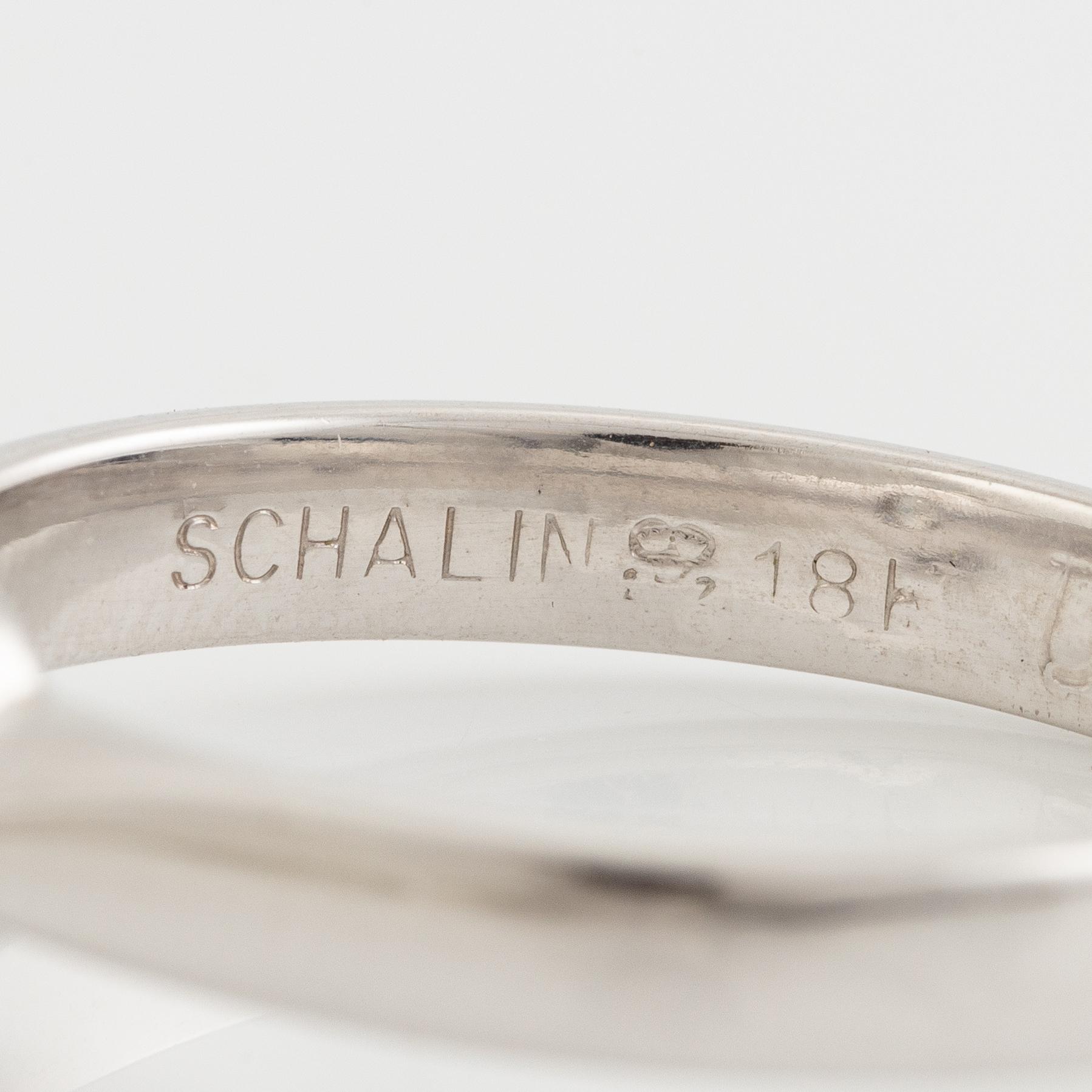 Ring, Schalins, 18K white gold with brilliant-cut diamond and accompanying report IGI.
