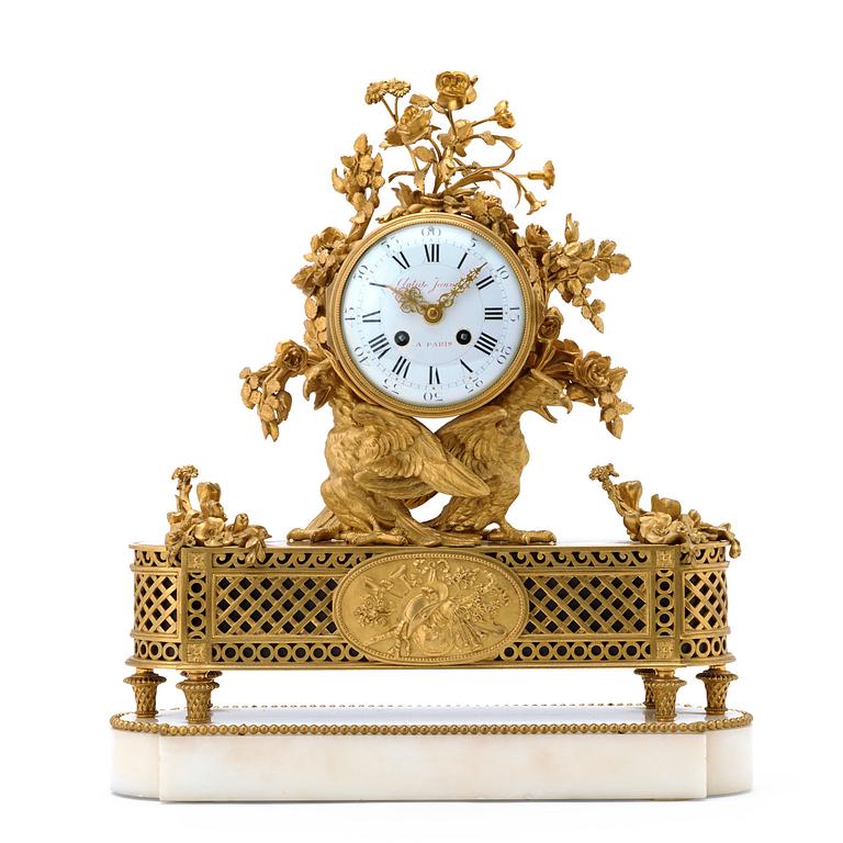 A Louis XVI-style late 19th century mantel clock by Eugene Hazart (1838-1891, bronze maker in Paris).