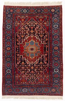 An oriental rug, old, c. 204 x 139 cm.