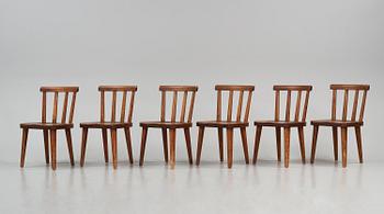 Axel Einar Hjorth, a set of six stained pine "Utö" chairs, Nordiska Kompaniet, Sweden, 1930s.