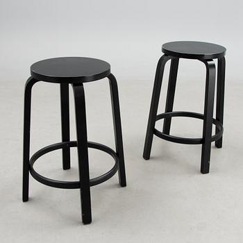 Two Model 64 High Chairs by Artek, 21st Century.