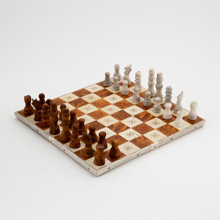 A birch and reindeer horn chessgame by Thore Sunna, before 1966, signed.