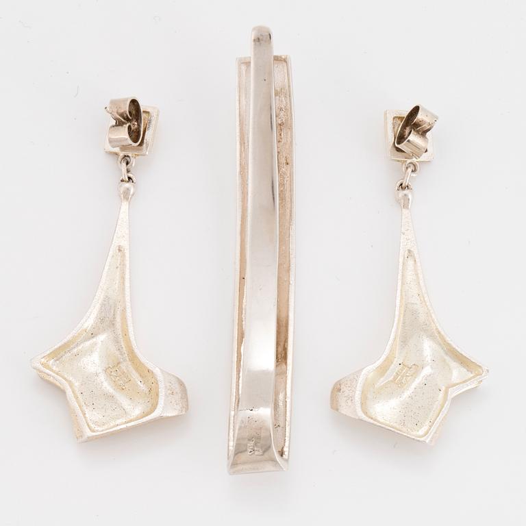 Earrings, silver, "Mini Punk" 1990, and tie clip, Björn Weckström, Lapponia.