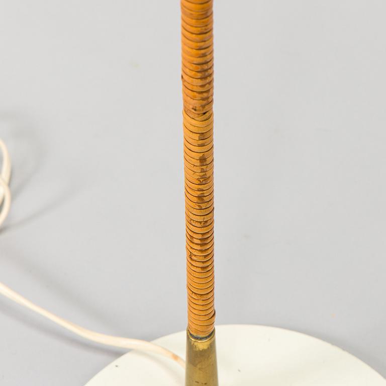 Paavo Tynell, a pair of mid-20th century K10-10 floor lamps for Taito Finland.