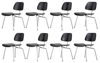 11. A set of eight Charles & Ray Eames 'DCM' chairs by Vitra.