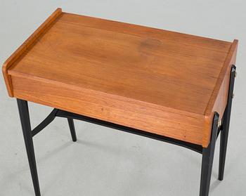 A mid 20th century dressing table and stool.