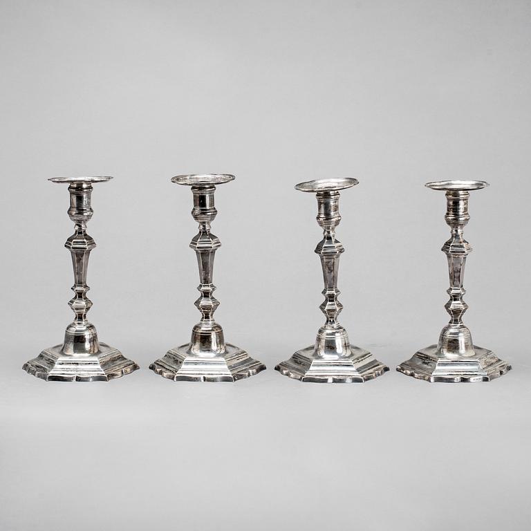 Two simular pairs of candlesticks, two marked Barde, Geneve 18th century, two with later marks.