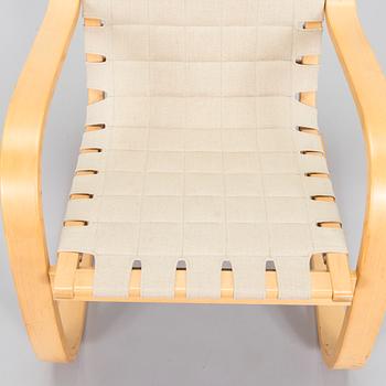 Alvar Aalto, a 1980s Artek 406 armchair.