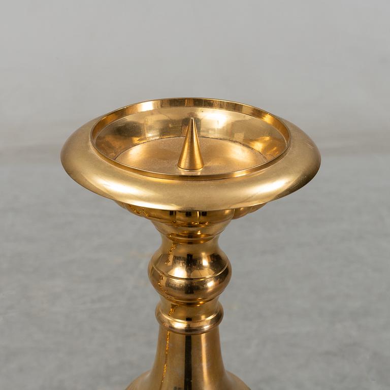 A pair of late 20th century or early 21th century brass altar candlesticks.