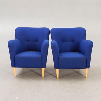 A pair of Swedese Nova 21st century easy chairs.