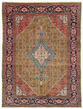 An oriental carpet, a. 272 x 208 cm.