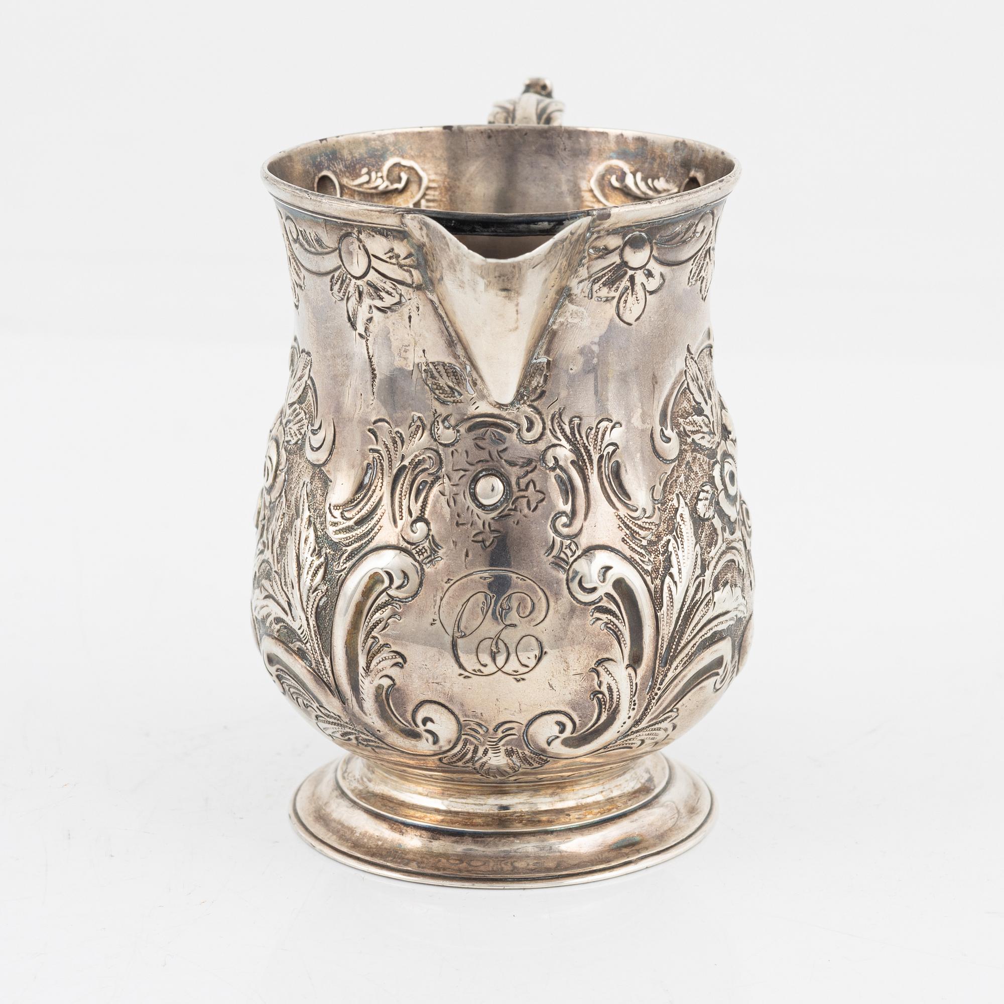 An English silver creamer, London, 1887.