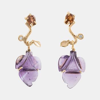 Carved amethyst, tourmaline and brilliant cut diamond earrings.