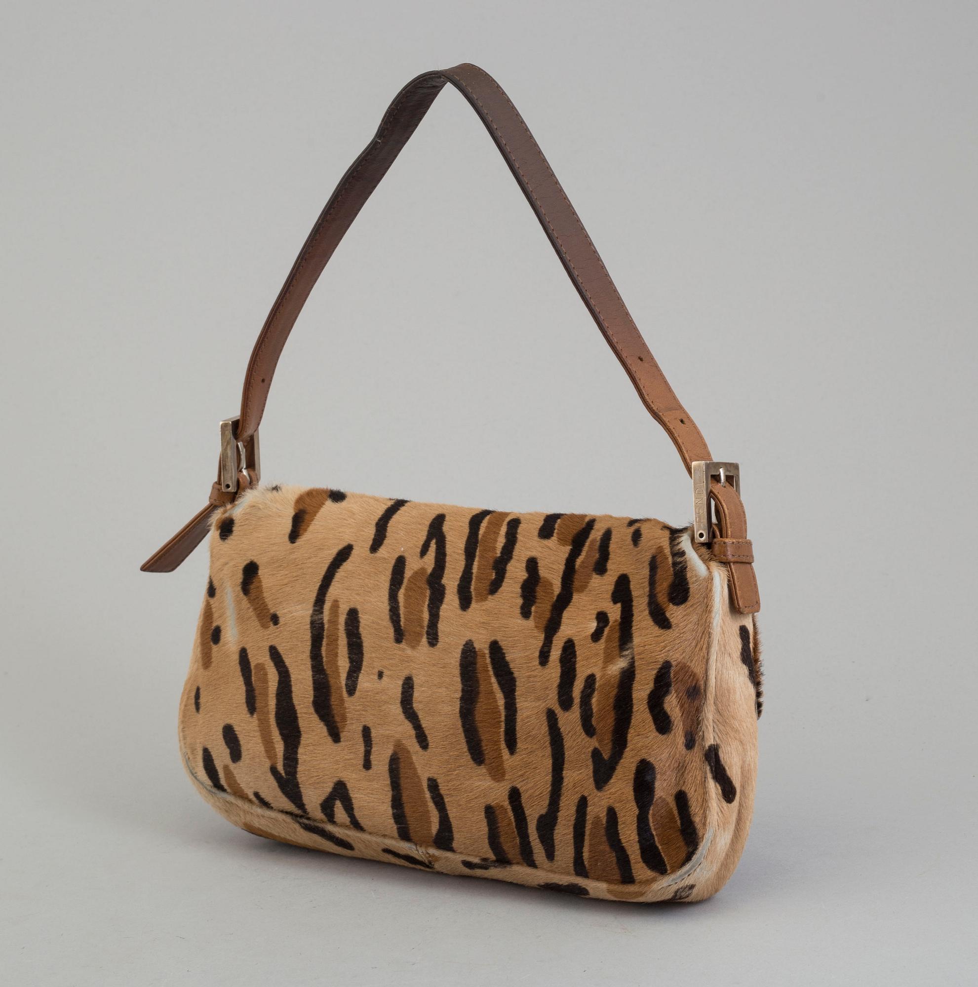 FENDI, a pony hair handbag.