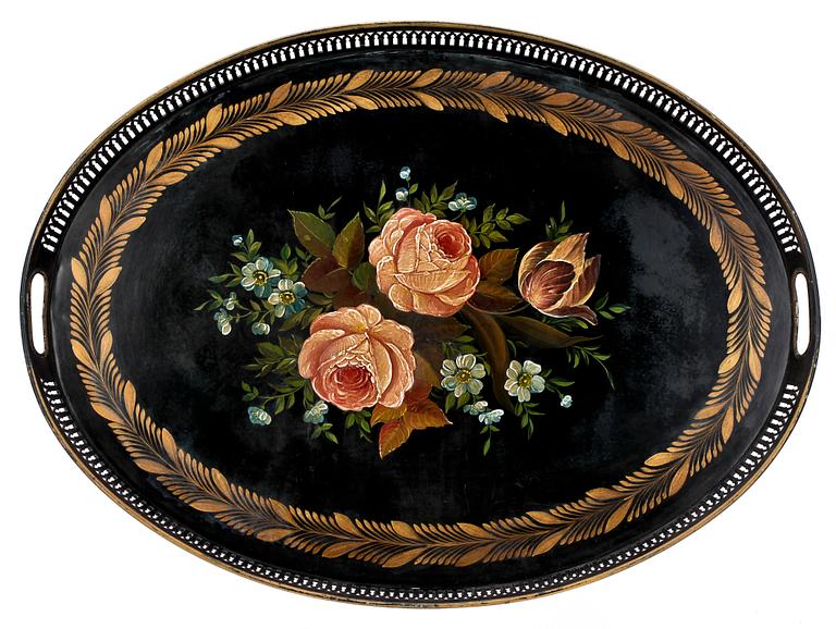 A black 19th Century tin tray.