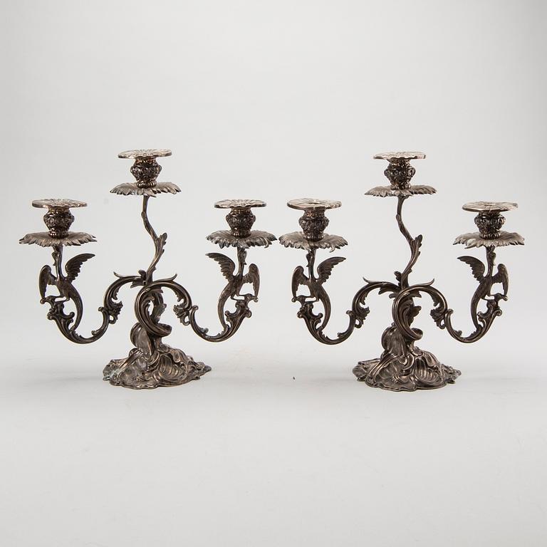 A pair of Swedish silver candelabra mark of GUSTAF MÖLLENBORG Stockholm 1846 , total weight ca 4420 gr, height 31 cm.