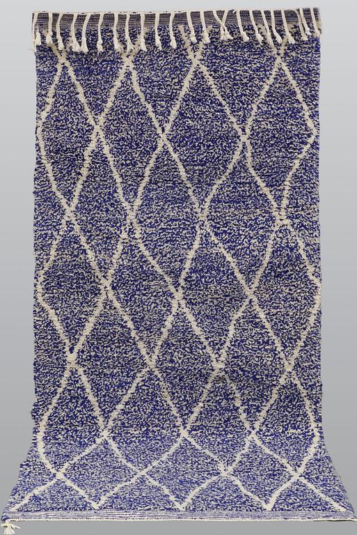 A carpet, Morocco, ca 240 x 104 cm.