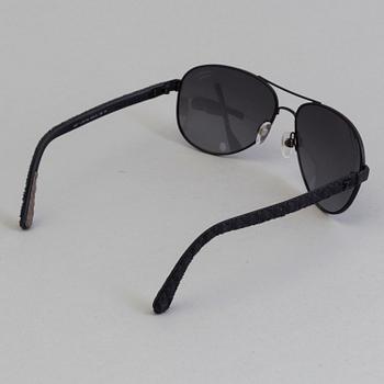 Chanel black pilot summer glasses.