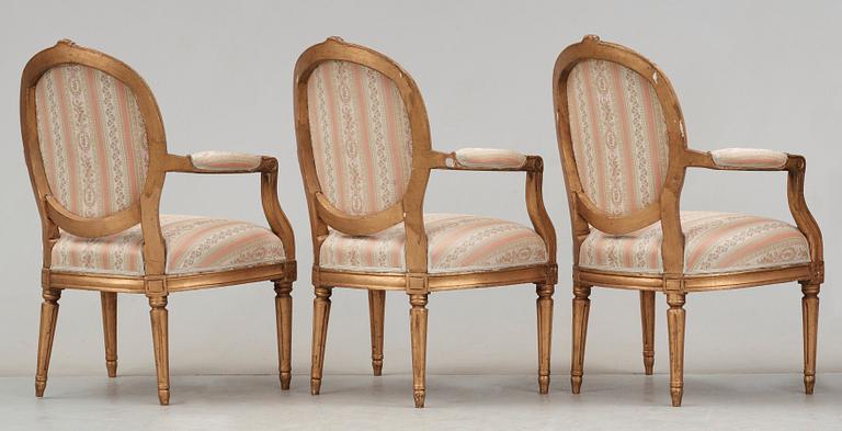 Three Gustavian 18th century armchairs.