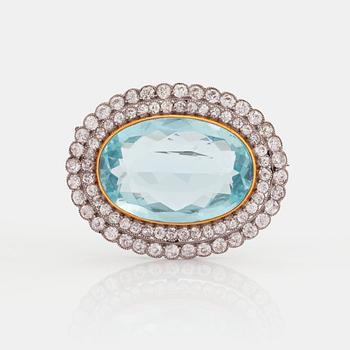 778. BROSCH med en akvamarin och gammalslipade diamanter.