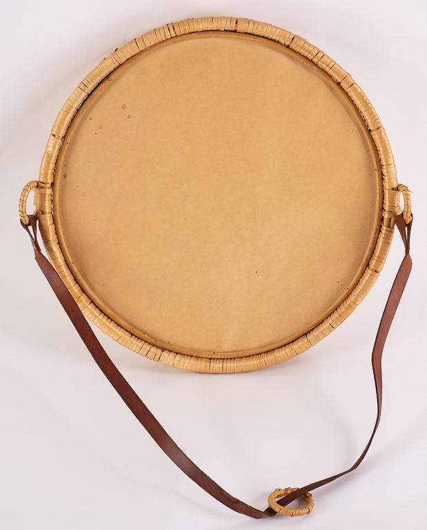 A rattan mirror.