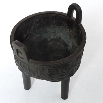 A Chinese tripod bronze censer, Ming style, Qing dynasty (1644-1912).