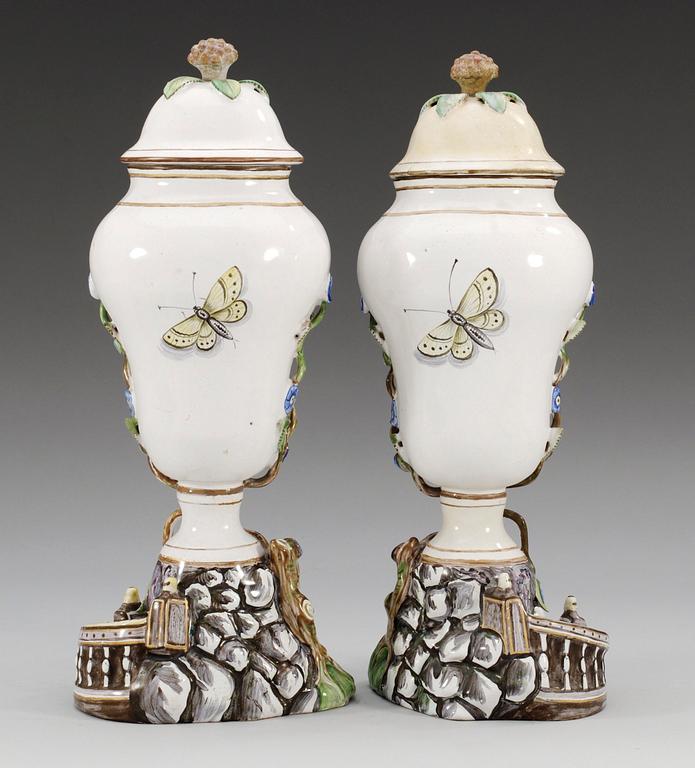 A pair of Marieberg faience vases with covers, 18th Century. (2).