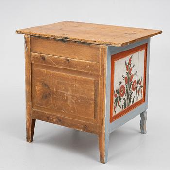 A Swedish folk art polychrome-painted table from Järvsö, Hälsingland, dated 1834.