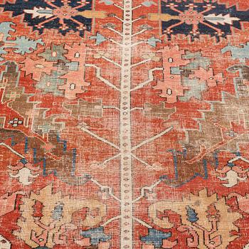 A antique Heriz carpet, ca 384 x 275 - 290 cm.