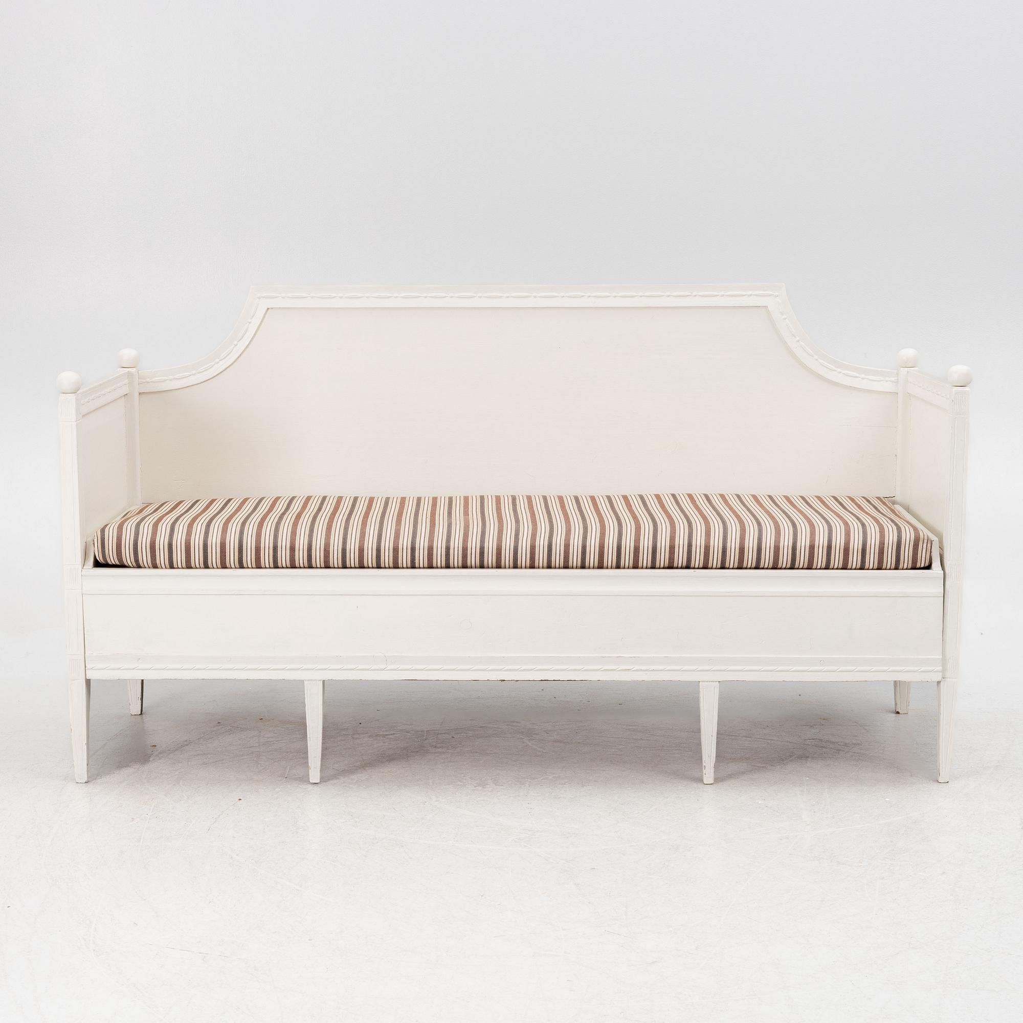 A late Gustavian sofa, early 19th century.