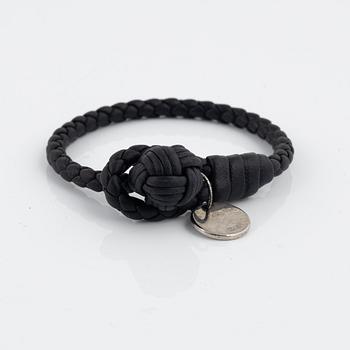 Bottega Veneta, a wallet and bracelet.