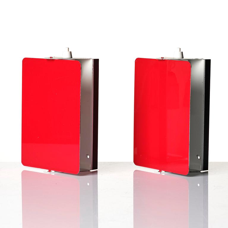 Charlotte Perriand, a pair of wall lights model "CP1", La Société Centrale d'Eclairage, France, 1960s.