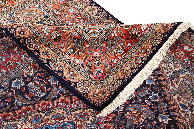 A Kashmar carpet, c. 310 x 203 cm.