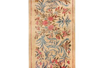 A semi-antique Keshan runner, c. 523 x 82 cm.
