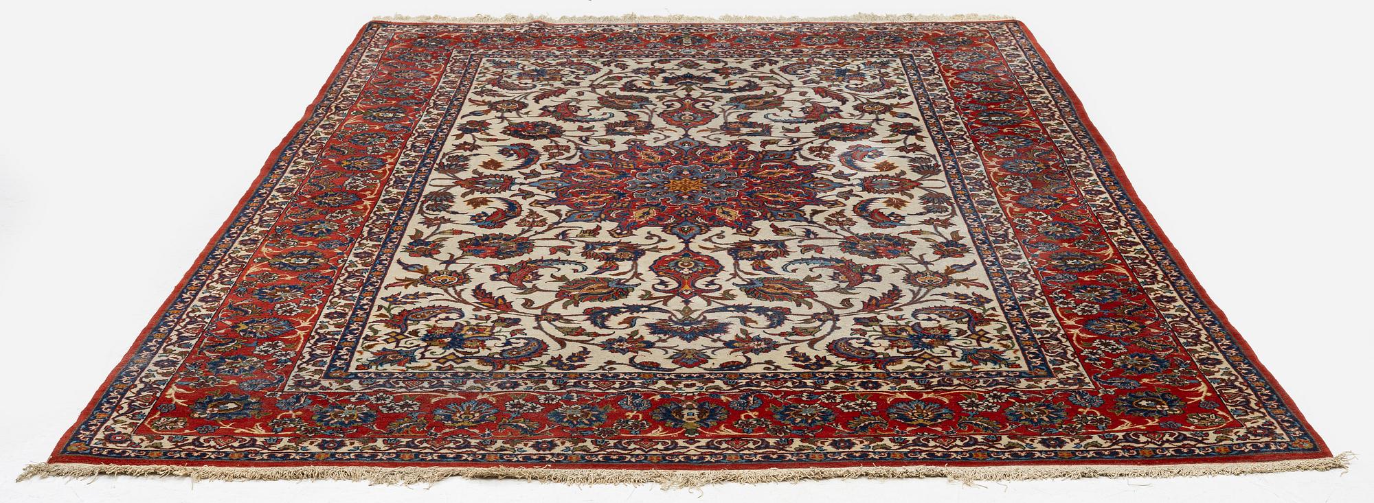 A semi-antique Isfahan carpet, central Persia, c. 314 x 197 cm.
